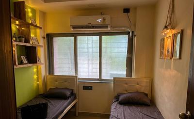 Bedroom Image of Blue Orchid’s Nest – Premium Girls PG in Nerul, Navi Mumbai