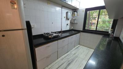Kitchen Image of 800 Sq.ft 2 BHK Apartment / Flat for sale in Raj Mandir, Andheri West Mumbai for Rs. 27500000