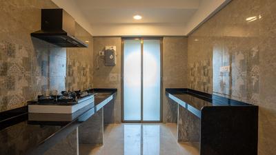 Kitchen Image of 1025 Sq.ft 3 BHK Apartment / Flat for sale in Tharwani Solitaire Phase III, Ulhasnagar Thane for Rs. 6425000