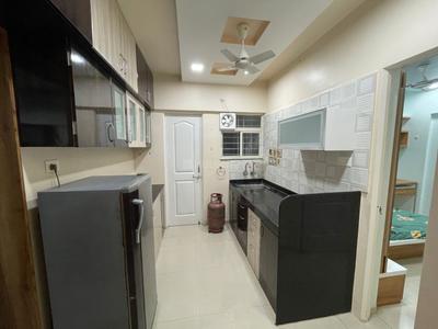 Kitchen Image of 750 Sq.ft 1 BHK Apartment / Flat for rent in Ashtavinayak City, Fursungi Pune for Rs. 19500
