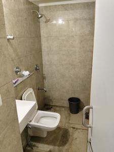 Common Bathroom Image of 765 Sq.ft 2 BHK Apartment / Flat for sale in Orchid Blues, Shela Ahmedabad for Rs. 5500000