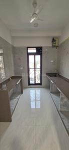 Kitchen Image of 1050 Sq.ft 3 BHK Apartment / Flat for sale in Vile Parle West Mumbai for Rs. 45000000