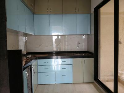 Kitchen Image of 970 Sq.ft 2 BHK Apartment / Flat for sale in Om Shivam Arjun, Kamothe Navi Mumbai for Rs. 11500000