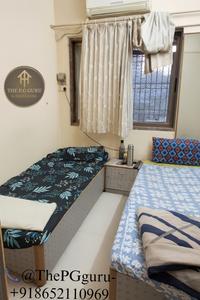 Bedroom Image of Thepgguru Boys PG  in Andheri East, Mumbai