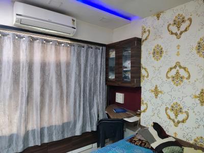Bedroom Image of 730 Sq.ft 1 BHK Apartment / Flat for rent in Hiranandani The Walk, Hiranandani Estate Thane for Rs. 40000