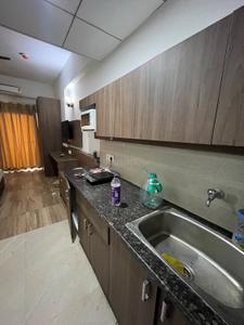 Kitchen Image of 440 Sq.ft 1 RK Studio for rent in Paramount Golfforeste Villas, Surajpur Greater Noida for Rs. 17001