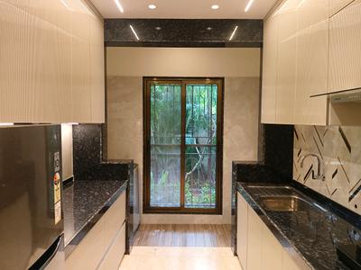 Kitchen Image of 1000 Sq.ft 2 BHK Apartment / Flat for sale in Regency Anantam, Dombivli East Thane for Rs. 7999999