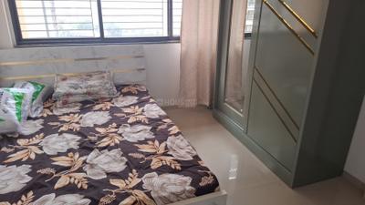Bedroom Image of 780 Sq.ft 1.5 BHK Apartment / Flat for rent in Long Island, Charholi Budruk Pune for Rs. 24000