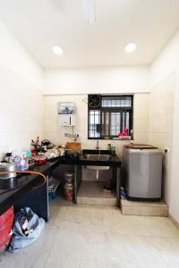 Kitchen Image of 950 Sq.ft 2 BHK Apartment / Flat for sale in Tathawade Pune for Rs. 8500000