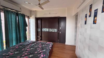 Bedroom Image of 700 Sq.ft 1.5 BHK Apartment / Flat for rent in Kaamdhenu Swarna Anant, Kopar Khairane Navi Mumbai for Rs. 38000