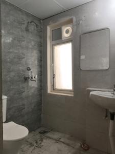 Common Bathroom Image of 830 Sq.ft 2.5 BHK Apartment / Flat for sale in Amrapali Dream Valley 2, Noida Extension Greater Noida for Rs. 6600000