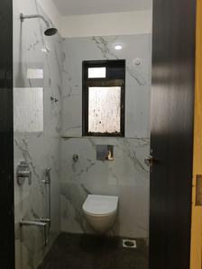 Common Bathroom Image of 884 Sq.ft 2 BHK Apartment / Flat for sale in Kulswamini Sukrya Heights, Dombivli West Thane for Rs. 5900000