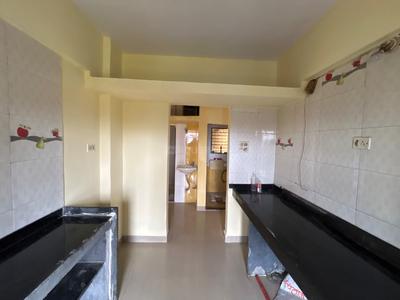 Kitchen Image of 690 Sq.ft 1 BHK Apartment / Flat for rent in Shankheshwar Presidency, Kalyan West Kalyan for Rs. 11000