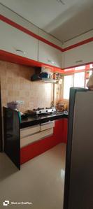 Kitchen Image of 680 Sq.ft 1 BHK Apartment / Flat for rent in Spine Road Pune for Rs. 18500