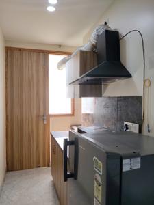 Kitchen Image of 980 Sq.ft 1 BHK Builder Floor for rent in Sector 27 Gurgaon for Rs. 34000