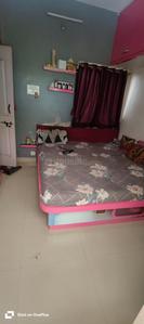 Bedroom Image of 680 Sq.ft 1 BHK Apartment / Flat for rent in Spine Road Pune for Rs. 18500