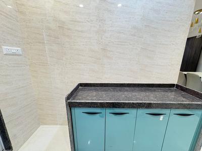 Kitchen Image of 650 Sq.ft 1 BHK Apartment / Flat for sale in Metro Luxuria, Thakurli Thane for Rs. 4810000