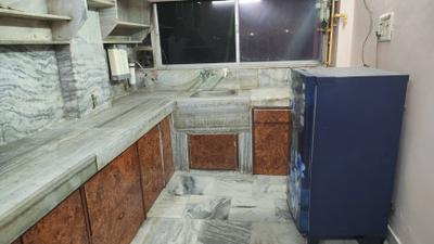 Kitchen Image of 1250 Sq.ft 2 BHK Apartment / Flat for rent in Ambanagar Surat for Rs. 25000