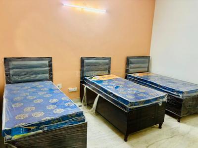 Bedroom Image of HOUSITIZE PG  in Sector 27, Noida