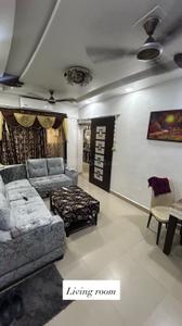 Living Room Image of 830 Sq.ft 2 BHK Apartment / Flat for sale in Thakurli Thane for Rs. 7499999