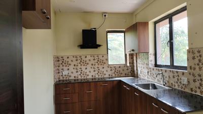 Kitchen Image of 1500 Sq.ft 3 BHK Apartment / Flat for sale in New Town Kolkata for Rs. 10800000