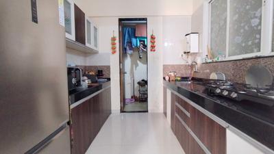 Kitchen Image of 1071 Sq.ft 2 BHK Apartment / Flat for sale in AG Imperial Towers, Mohammed Wadi Pune for Rs. 7500000
