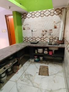 Kitchen Image of 900 Sq.ft 2 BHK Independent House for rent in Halasuru Bengaluru for Rs. 12000