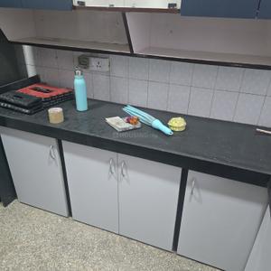 Kitchen Image of 950 Sq.ft 2 BHK Apartment / Flat for rent in Gokul Plaza, Kandivali East Mumbai for Rs. 45000
