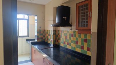 Kitchen Image of 1150 Sq.ft 2.5 BHK Apartment / Flat for sale in Raheja Acropolis, Chembur Mumbai for Rs. 35000000