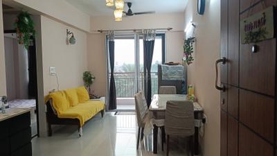Living Room Image of 1000 Sq.ft 3 BHK Apartment / Flat for sale in The Ecos, New Town Kolkata for Rs. 13500000