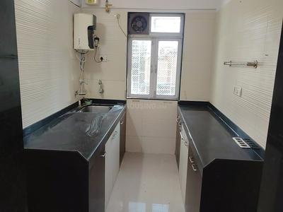 Kitchen Image of 970 Sq.ft 2 BHK Apartment / Flat for rent in Cosmos Classique, Thane West Thane for Rs. 34000