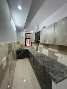 Kitchen Image of 675 Sq.ft 2 BHK Apartment / Flat for sale in Chhattarpur New Delhi for Rs. 4500000
