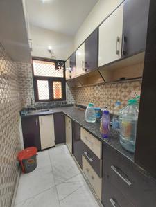 Kitchen Image of 600 Sq.ft 2 BHK Builder Floor for rent in Sector 8 Rohini New Delhi for Rs. 26000