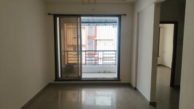 Living Room Image of 630 Sq.ft 1 BHK Apartment / Flat for sale in Happy Sarvodaya Trilok, Thakurli Thane for Rs. 4500000