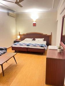 Bedroom Image of Itt inn in East Of Kailash, New Delhi