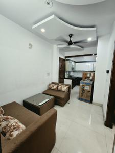Living Room Image of 1200 Sq.ft 2 BHK Builder Floor for rent in Ramesh Nagar New Delhi for Rs. 32000