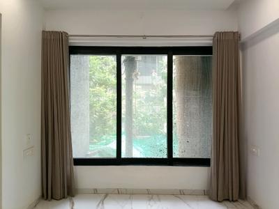 Living Room Image of 550 Sq.ft 1 BHK Apartment / Flat for sale in Kanakia Beverly Heights, Bhayandar East Mira Bhayandar for Rs. 8000000