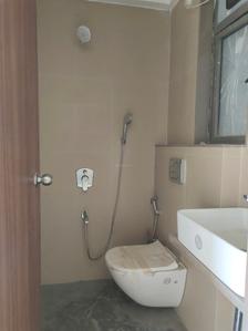 Common Bathroom Image of 606 Sq.ft 1 BHK Apartment / Flat for sale in Dimple Westwood 2, Kandivali West Mumbai for Rs. 11400000