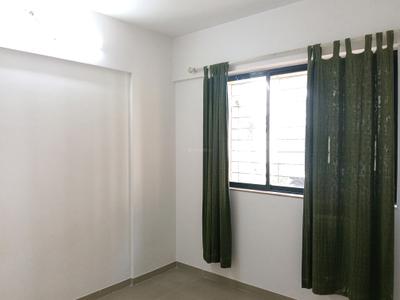 Bedroom Image of 370 Sq.ft 1 BHK Apartment / Flat for rent in Puraniks Home Town, Kasarvadavali Thane for Rs. 17000