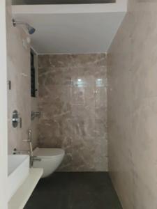 Common Bathroom Image of 785 Sq.ft 1.5 BHK Apartment / Flat for sale in Rajhans Moonstone, Vasai West Vasai for Rs. 7800000
