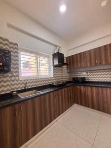 Kitchen Image of 950 Sq.ft 2 BHK Builder Floor for rent in Indira Nagar Bengaluru for Rs. 41000