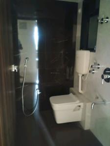 Common Bathroom Image of 690 Sq.ft 1 BHK Apartment / Flat for sale in Tharwani Meghna Montana Phase 3, Ambernath West Ambernath for Rs. 3000000