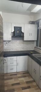 Kitchen Image of 1000 Sq.ft 2 BHK Apartment / Flat for rent in Satyam The Palm Residency, Mahalgaon Gwalior for Rs. 15000