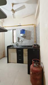 Kitchen Image of 595 Sq.ft 1 BHK Apartment / Flat for rent in Poddar Palm Enclave, Makarba Ahmedabad for Rs. 22500