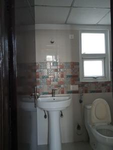 Common Bathroom Image of 1079 Sq.ft 2 BHK Apartment / Flat for sale in AFOWO Raksha Addela, Noida Extension Greater Noida for Rs. 8200000