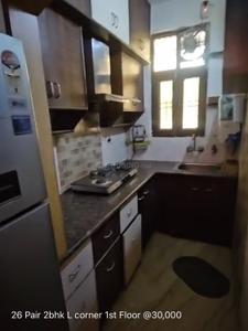 Kitchen Image of 800 Sq.ft 2 BHK Builder Floor for rent in Sector 7 Rohini New Delhi for Rs. 30000