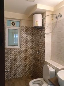 Common Bathroom Image of 749 Sq.ft 2 BHK Apartment / Flat for sale in Umang Winter Hills, Sewak Park New Delhi for Rs. 16500000