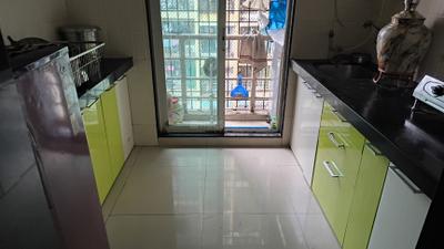 Kitchen Image of 695 Sq.ft 1 BHK Apartment / Flat for sale in Gajra Bhoomi Gardenia, Kalamboli Navi Mumbai for Rs. 6000000