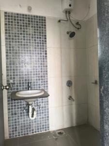 Common Bathroom Image of 1052 Sq.ft 2 BHK Apartment / Flat for sale in Kolte Patil Life Republic, Tathawade Pune for Rs. 7500000