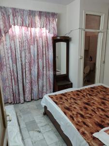Bedroom Image of 900 Sq.ft 2 BHK Builder Floor for rent in Lajpat Nagar New Delhi for Rs. 40000